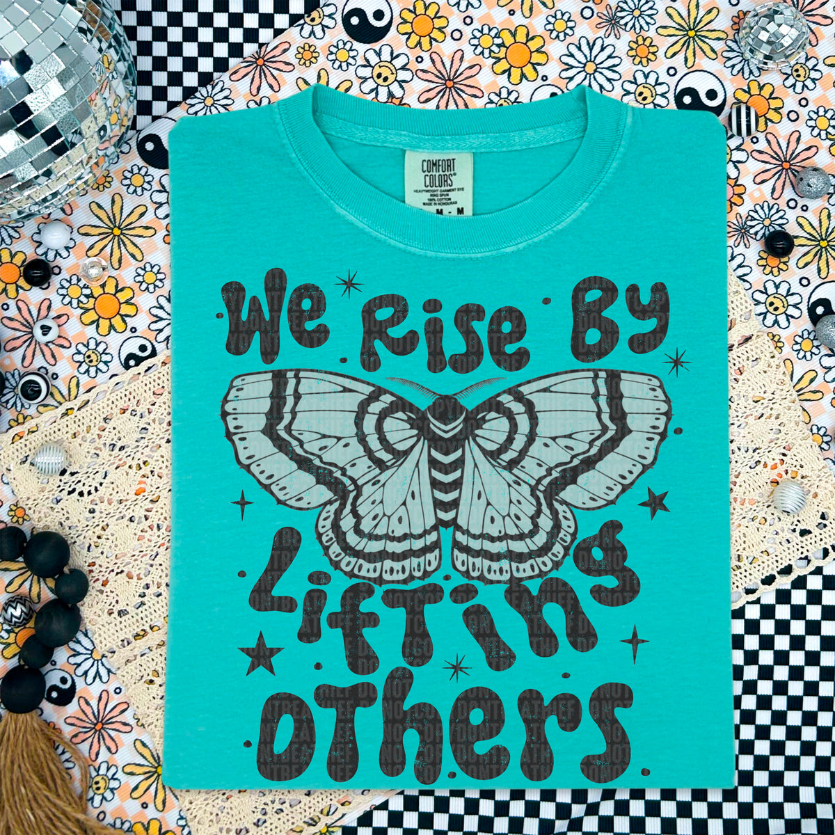 We rise by lifting others moth 97589 DTF transfer