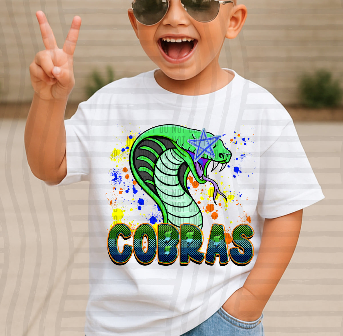 cobras paint splatter boy blue green and yellow (Caplinger) DTF Transfer