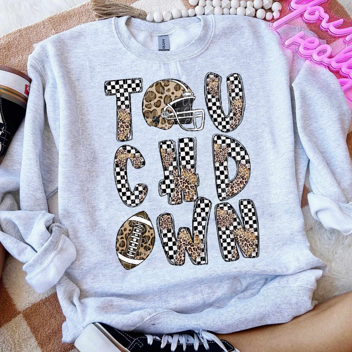 Touchdown helmet football leopard and checkered font city DTF transfer