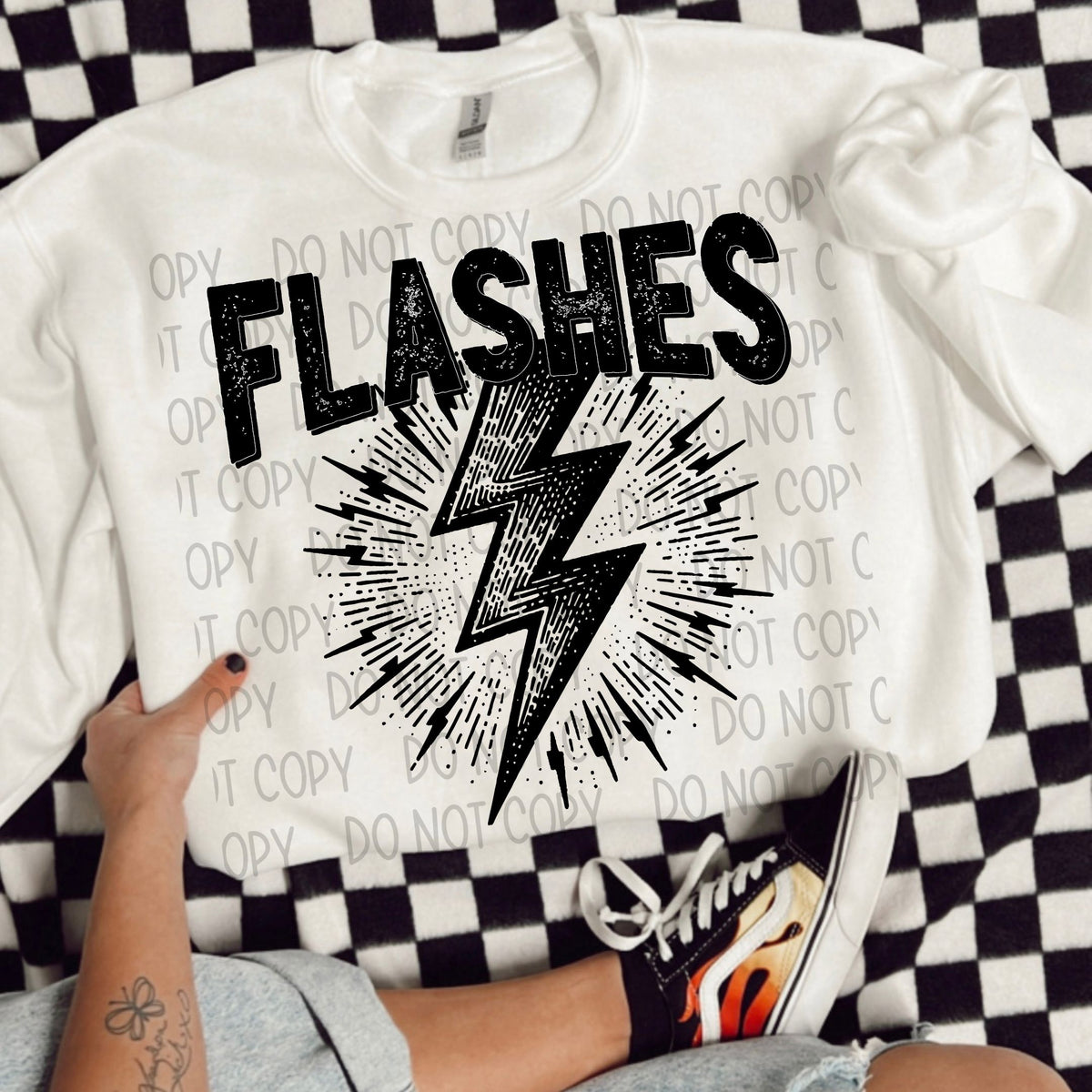 Flashes black/white outline DTF transfer