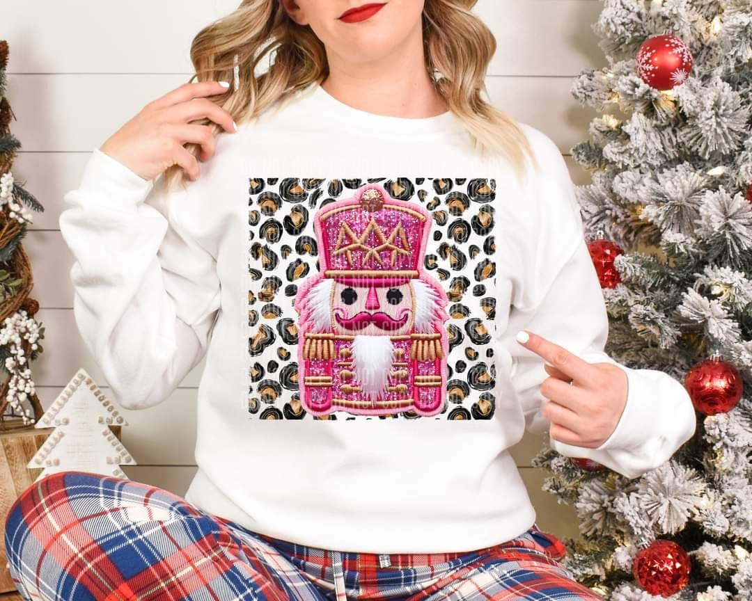 Pink nutcracker leopard background (caplinger) 60531 DTF transfer