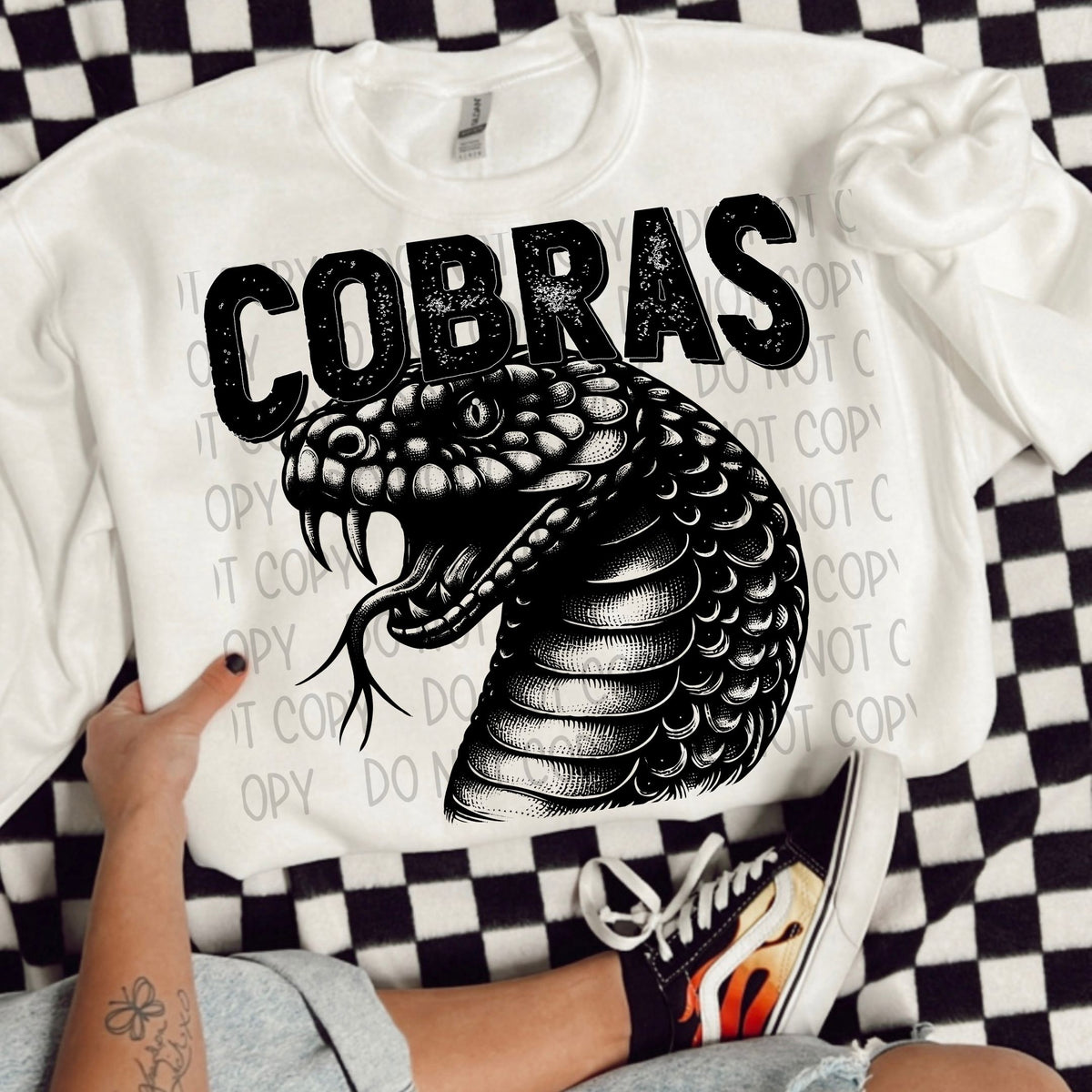 Cobras black/white outline DTF transfer