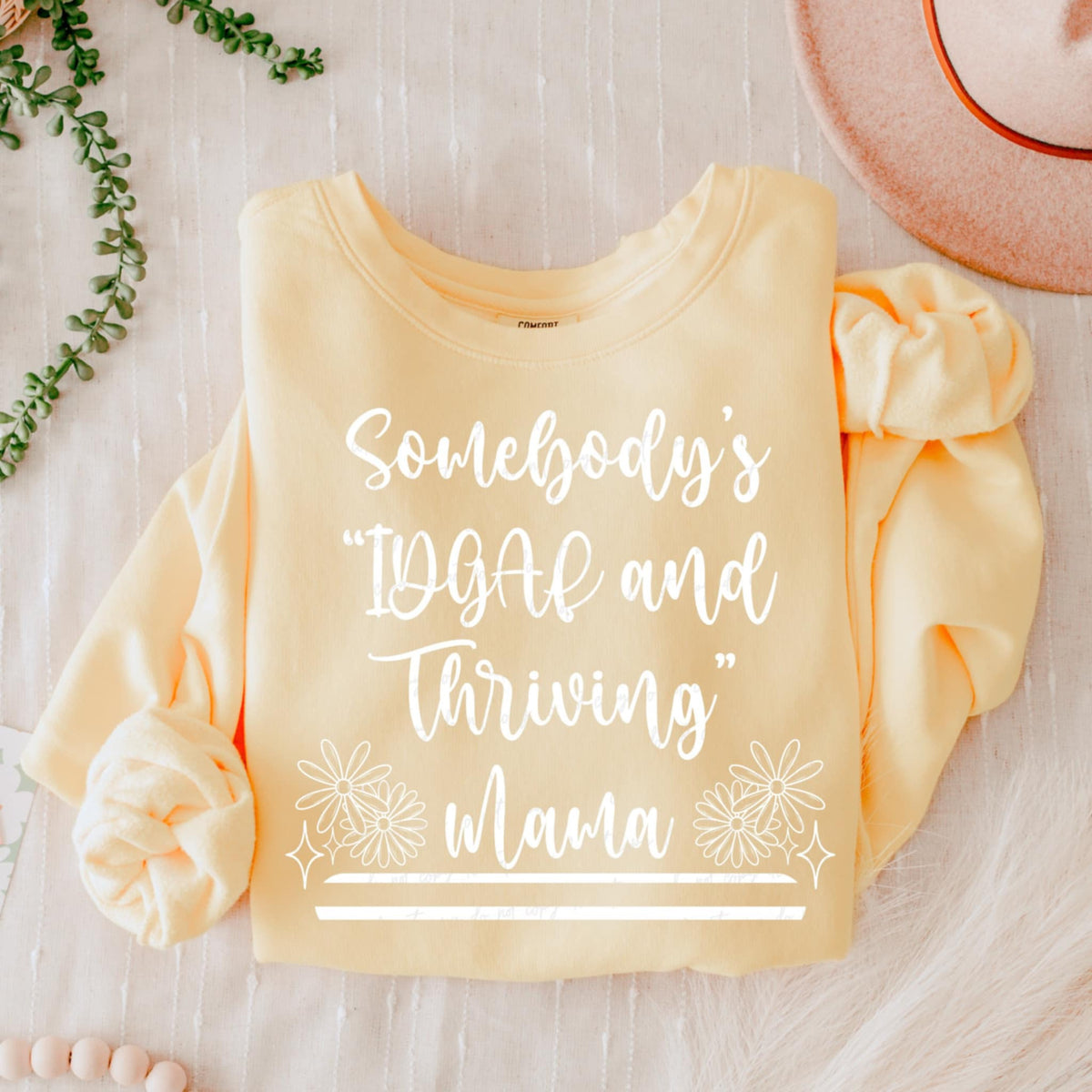 Somebody’s “idgaf and thriving” mama WHITE (VIRGO) 90698 DTF transfer