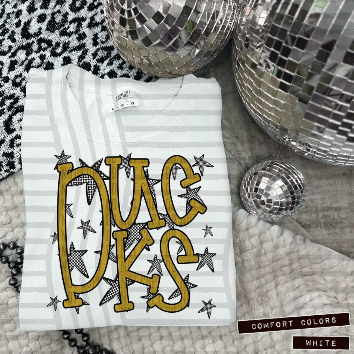 Gold Staggered Mascots (Caplinger)