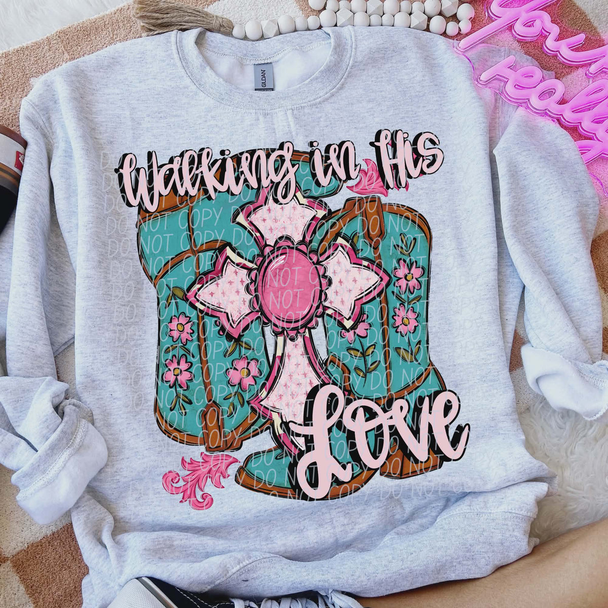 Walking in his love boots (teal and light pink letters) (city) DTF transfer