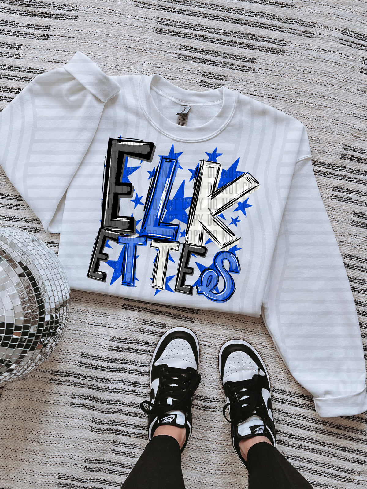 elkettes black and blue with blue stars (caplinger) DTF Transfer