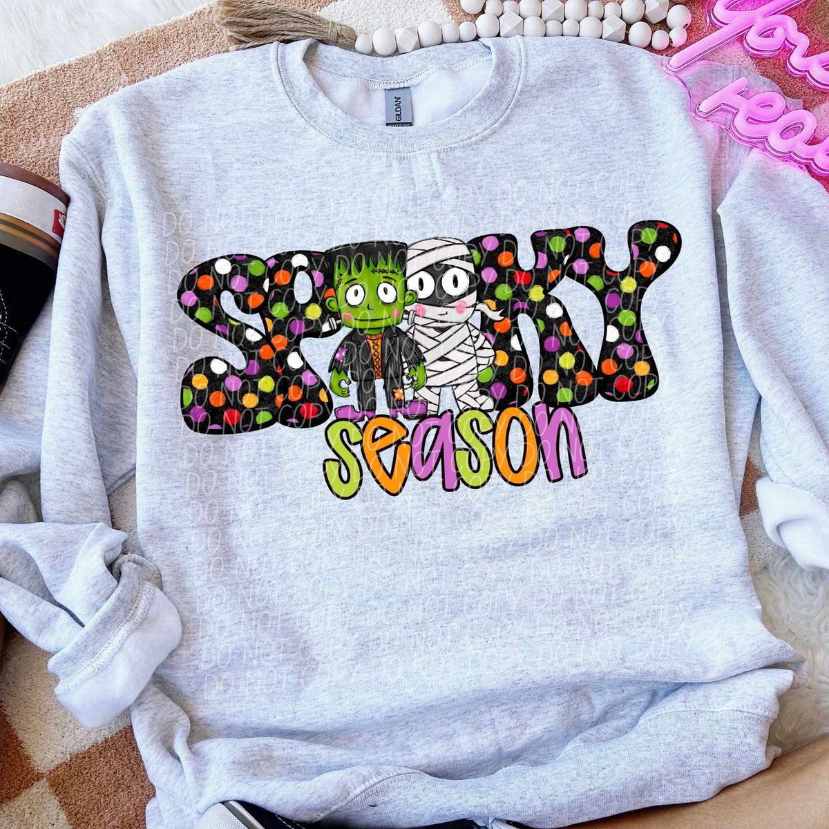 Spooky Season polka dot mummy and Frankenstein (city) DTF transfer