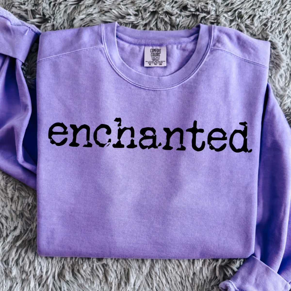 Enchanted black font (abd) DTF transfer