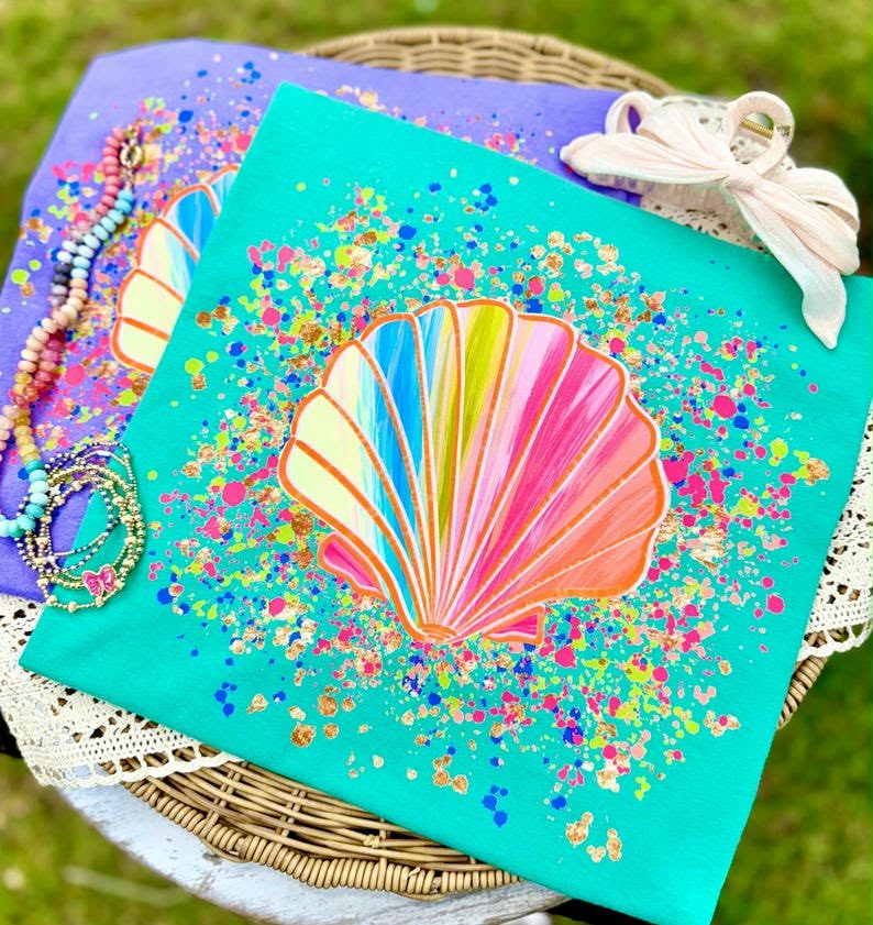 Shell with rainbow splatter Sunday Special DTF transfer