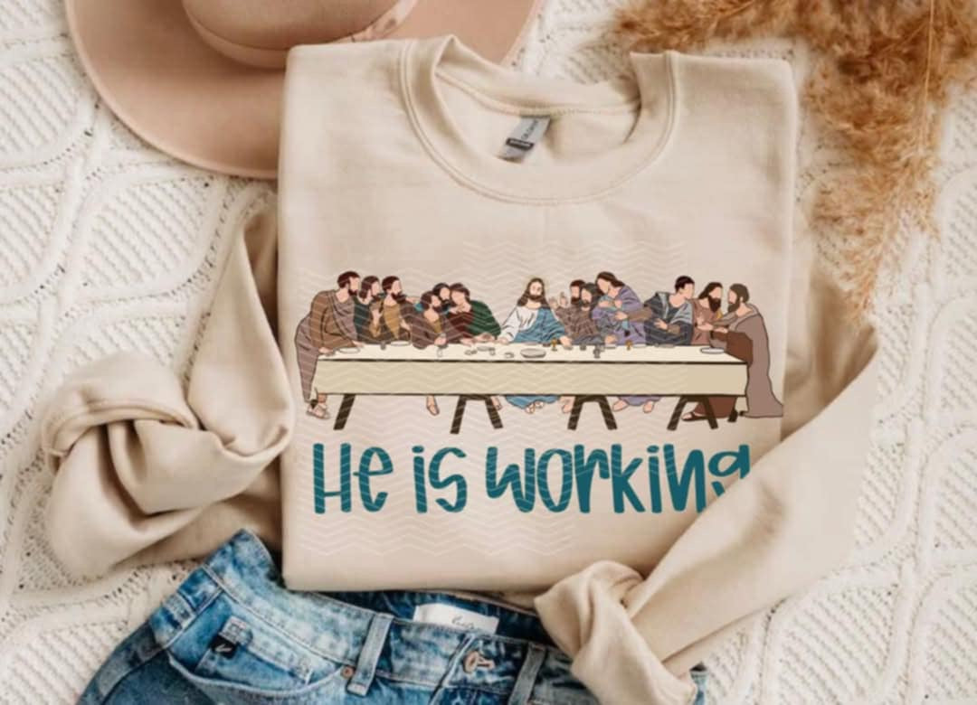 He is working blue font 85158 DTF transfer