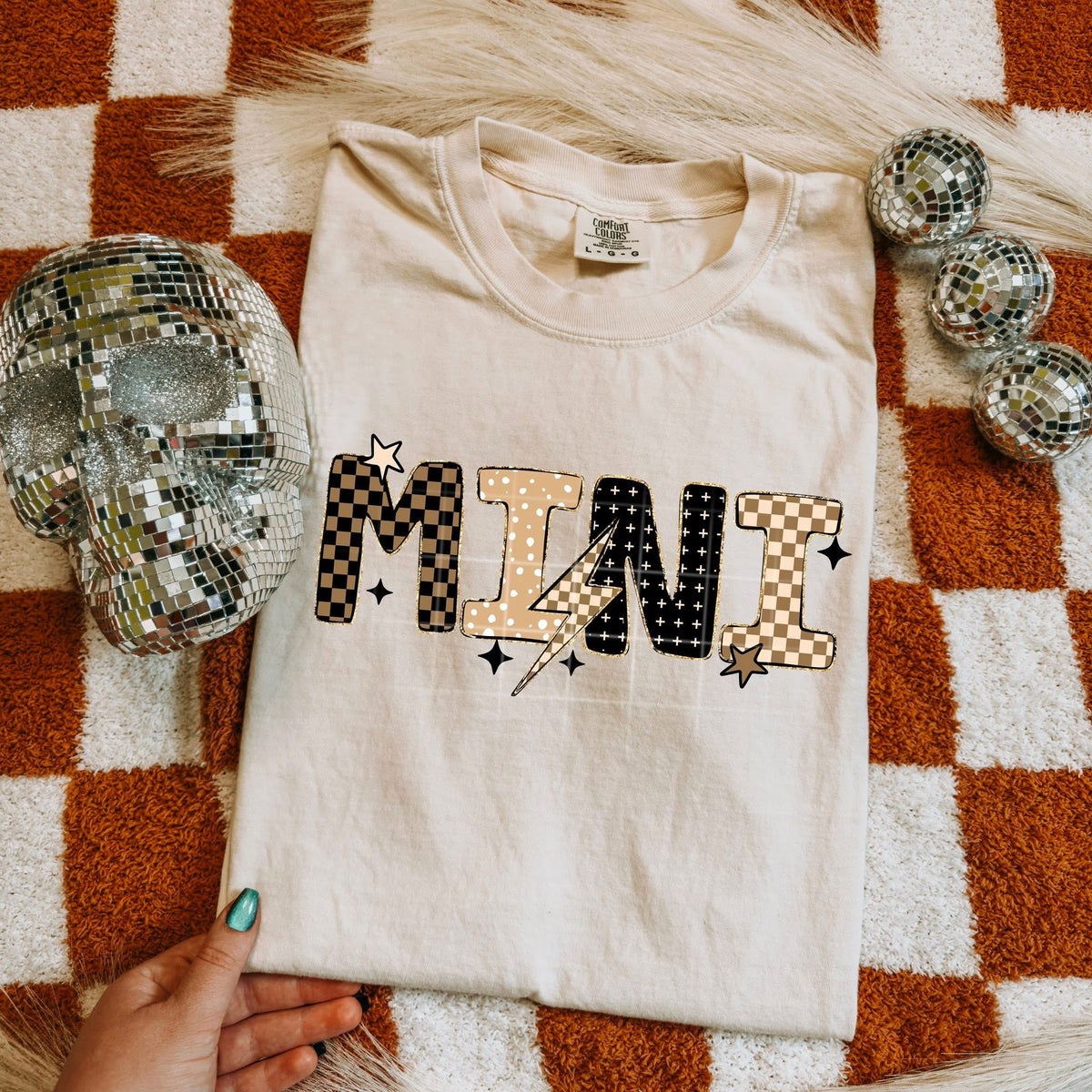 Neutral Mini with lightning bolt (csc) DTF transfer