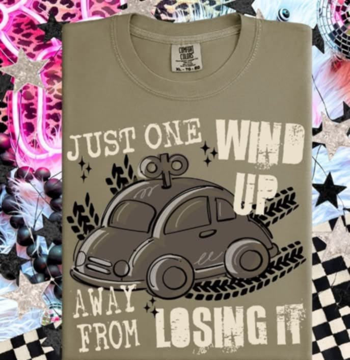 Just one wind up away from losing it cream font (S&G) 98777 DTF transfer
