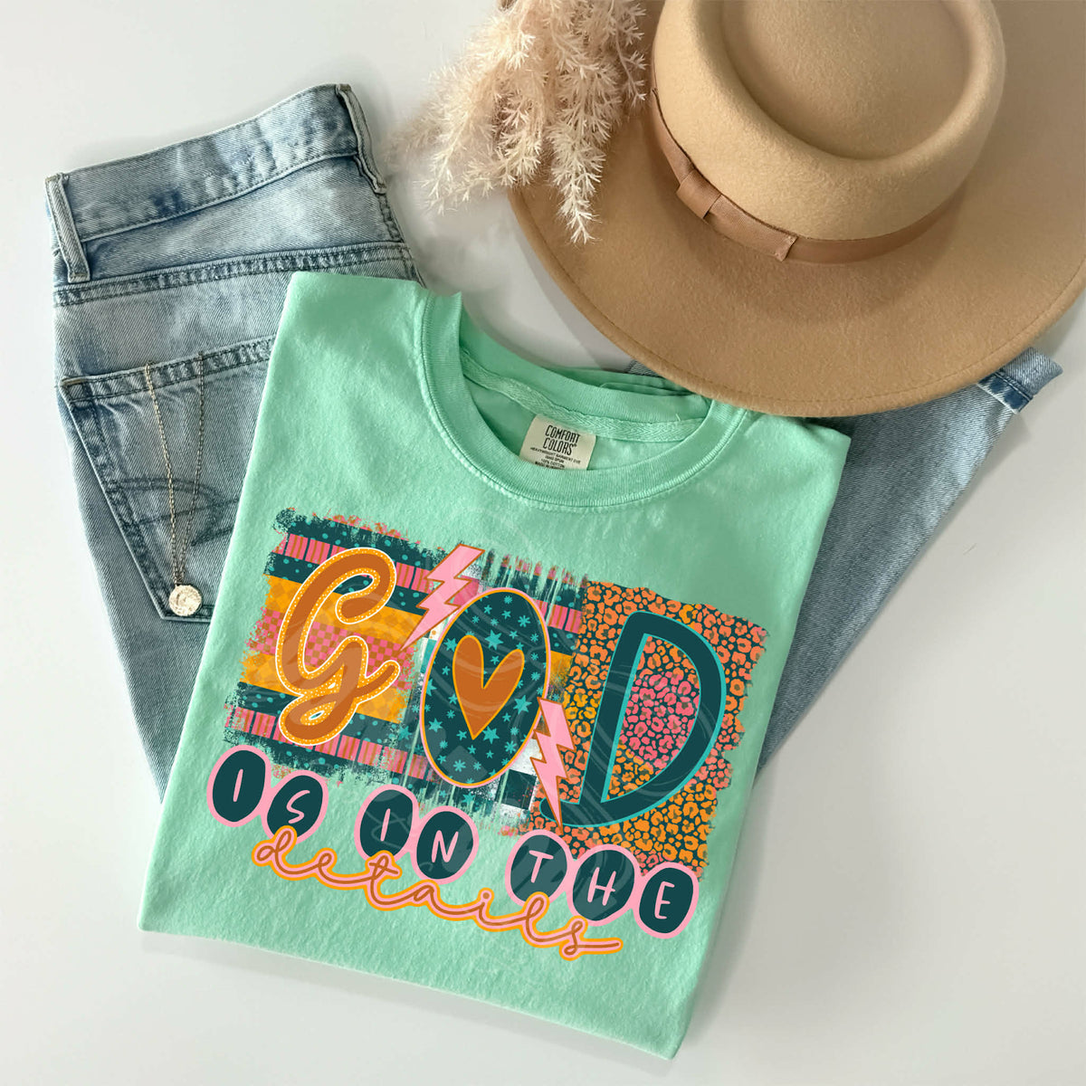 God is in the details (teal orange and pink) (C’s) DTF Transfer