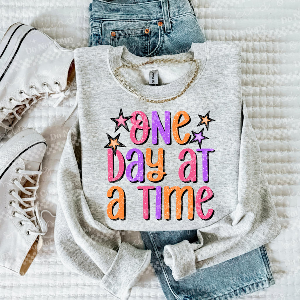One Day at A Time with pink purple orange stars DTF transfer