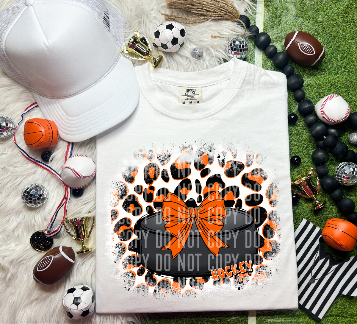 Hockey Puck Leopard Background Orange (Caplinger) DTF transfer