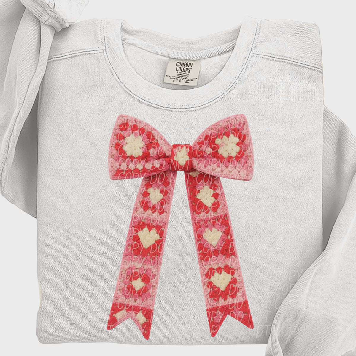 Red and pink crochet bow (city) DTF transfer