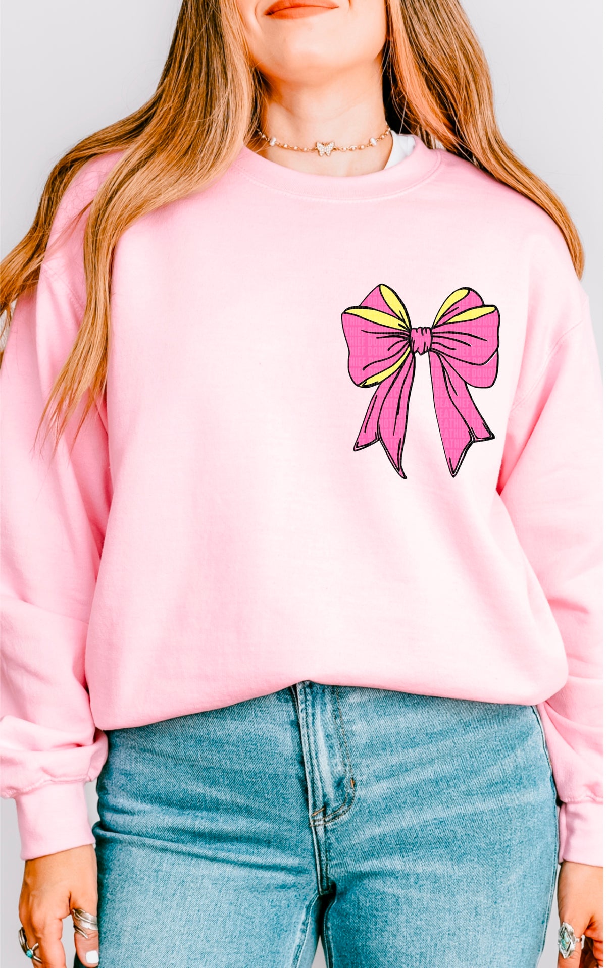 Pink and yellow bow black outline 93383 DTF transfer