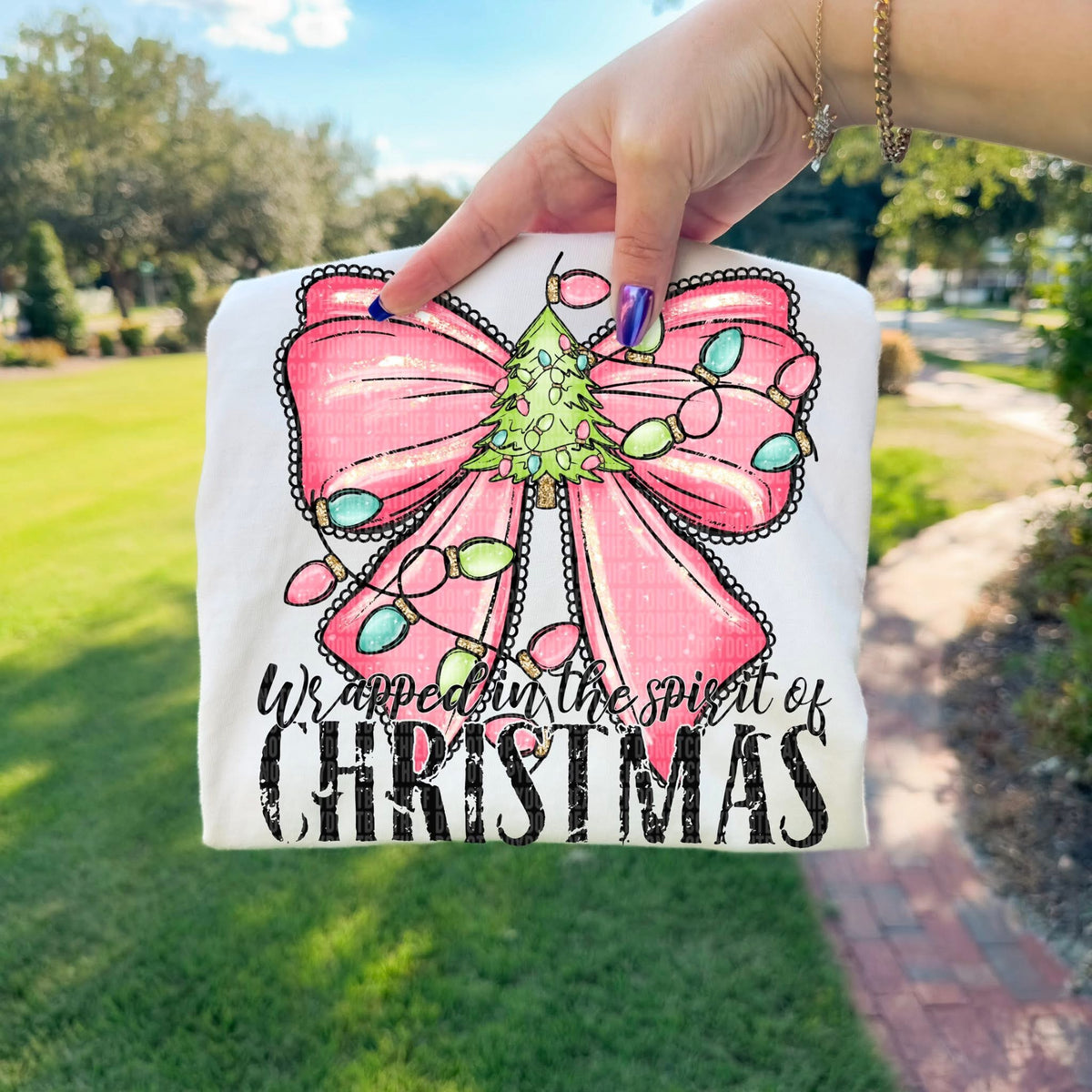 Wrapped in the spirit of Christmas bow (SDD) DTF Transfer