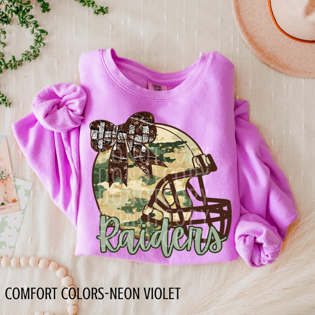 Raiders Camo Football Helmet with Bow (csg) DTF transfer