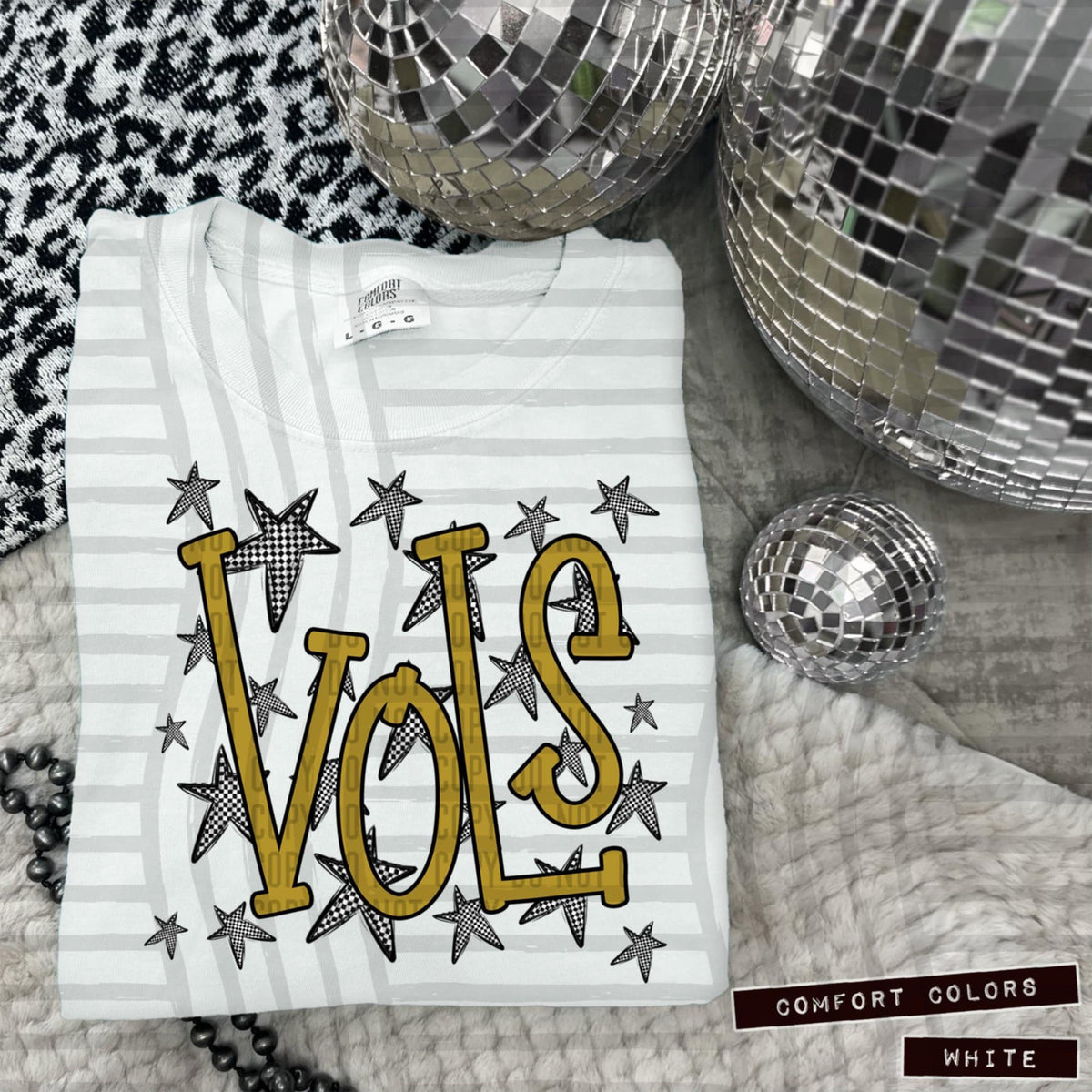 Gold Staggered Mascots (Caplinger)