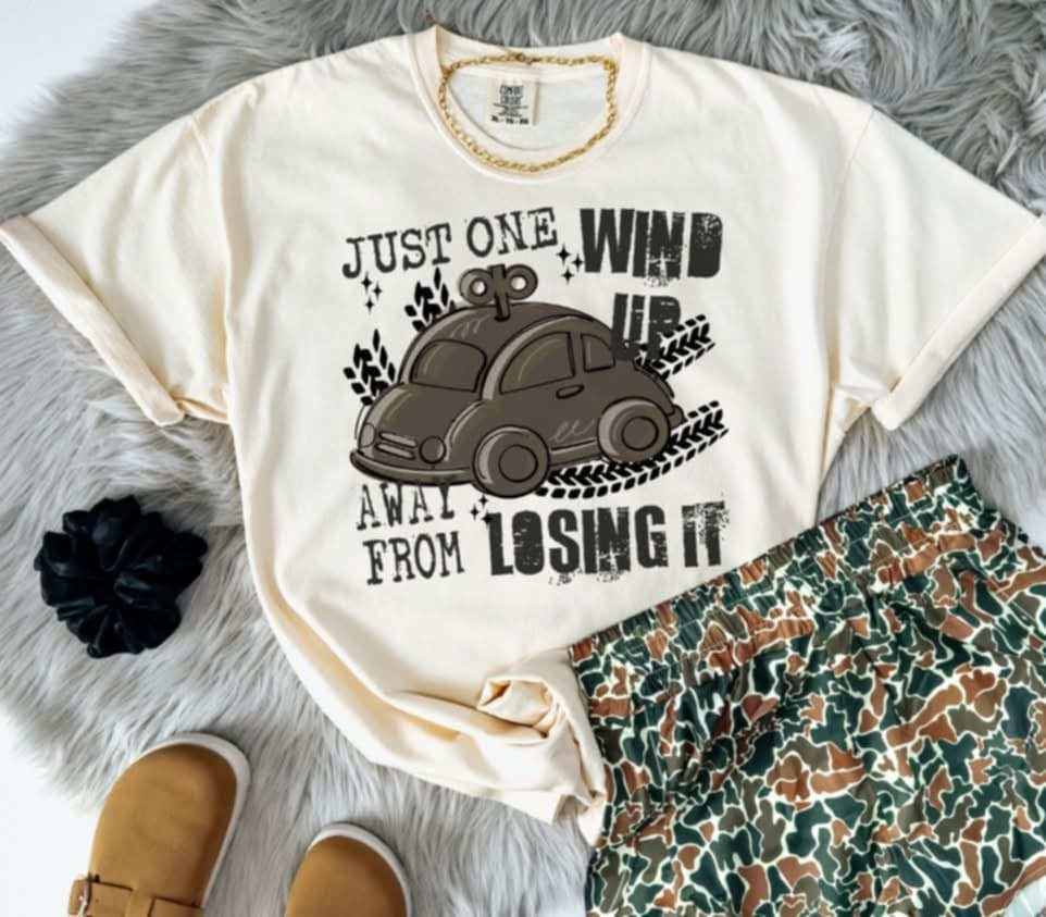 Just one wind up away from losing it black font (S&G) 98778 DTF transfer