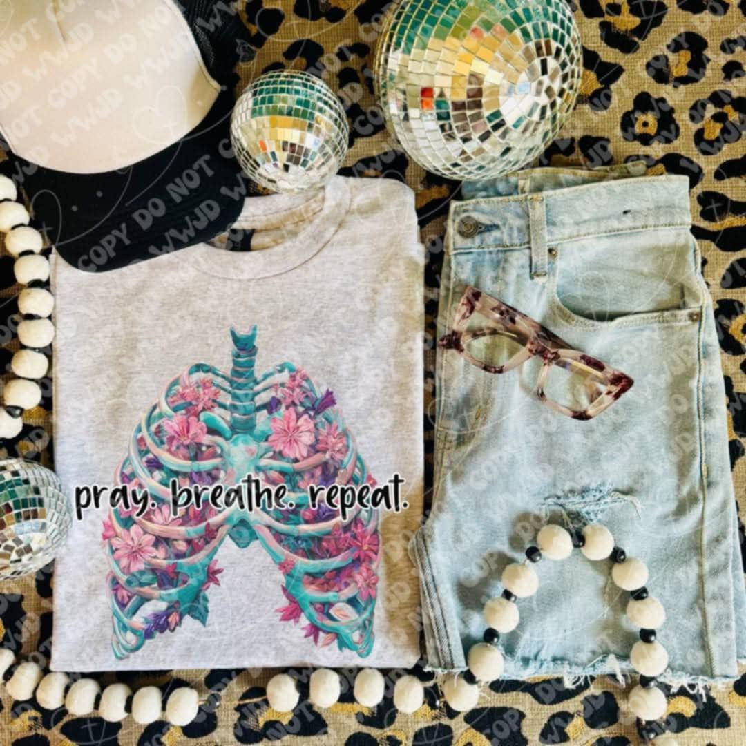 Pray Breathe Repeat ribcage DTF transfer