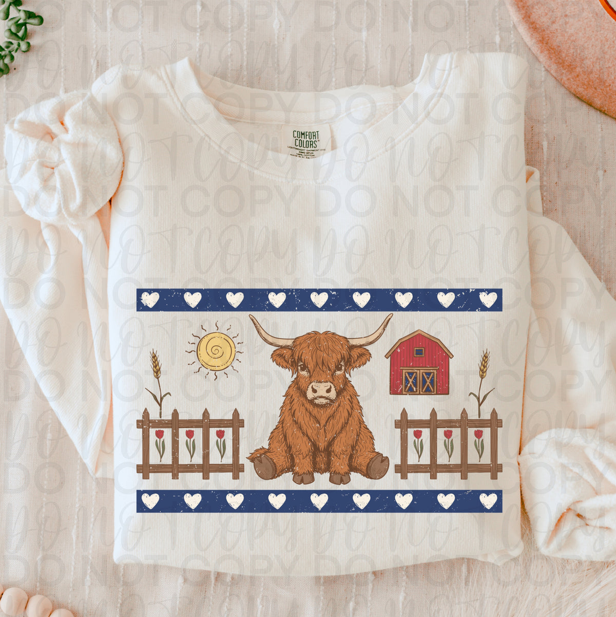 Cow in blue border w barn and sun (UAC) DTF Transfer
