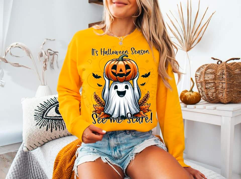It's halloween season see me scare ghost holding pumpkin DDD DTF transfer