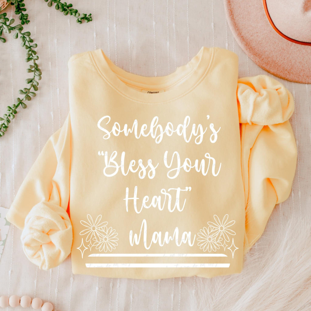 Somebody’s “bless your heart” mama WHITE (VIRGO) 90703 DTF transfer