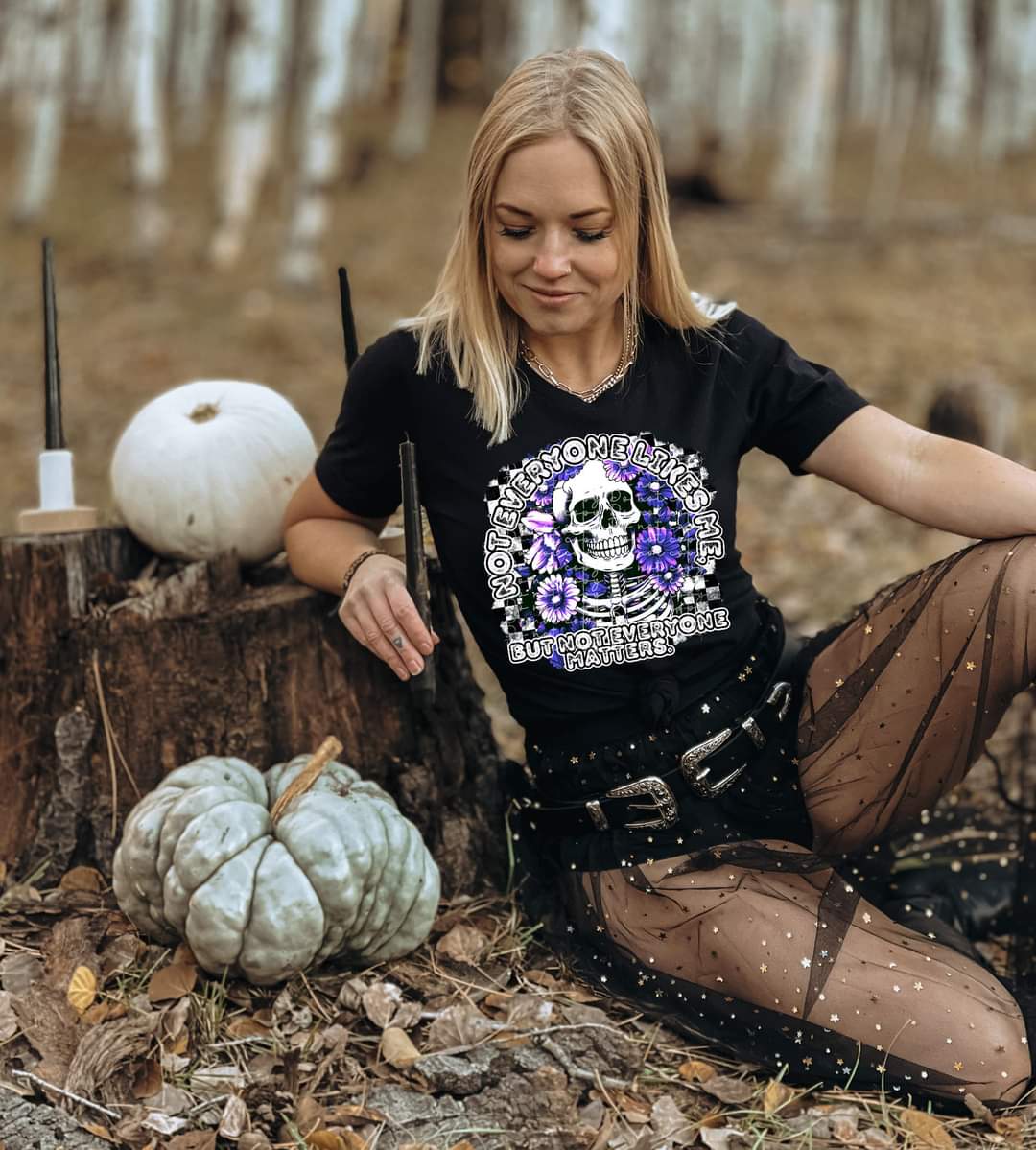 Not everyone likes me, but not everyone matters. (skeleton with purple florals) 650 DTF TRANSFER