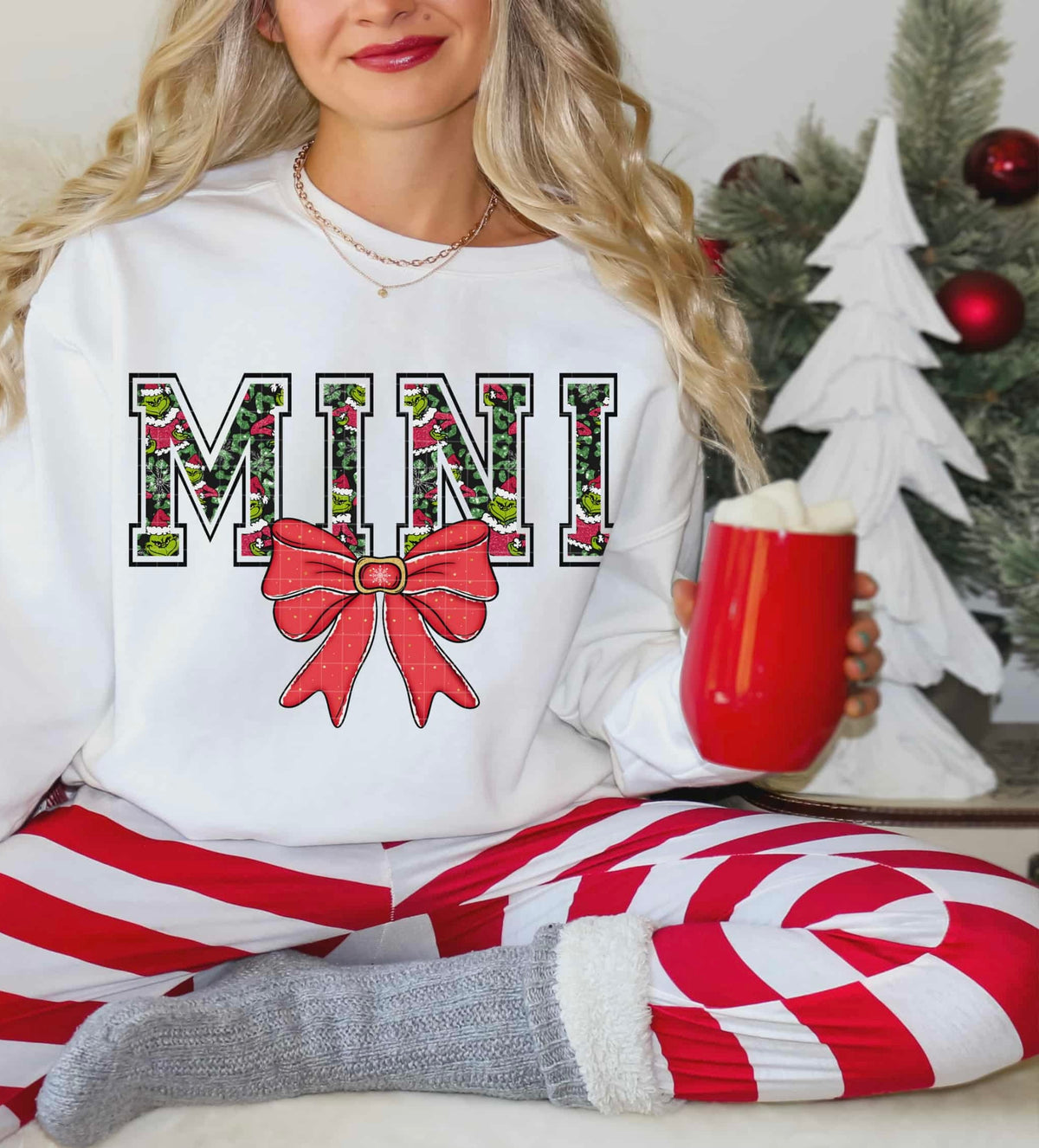 Mini green guy letters BLACK OUTLINE red bow (linda) DTF transfer