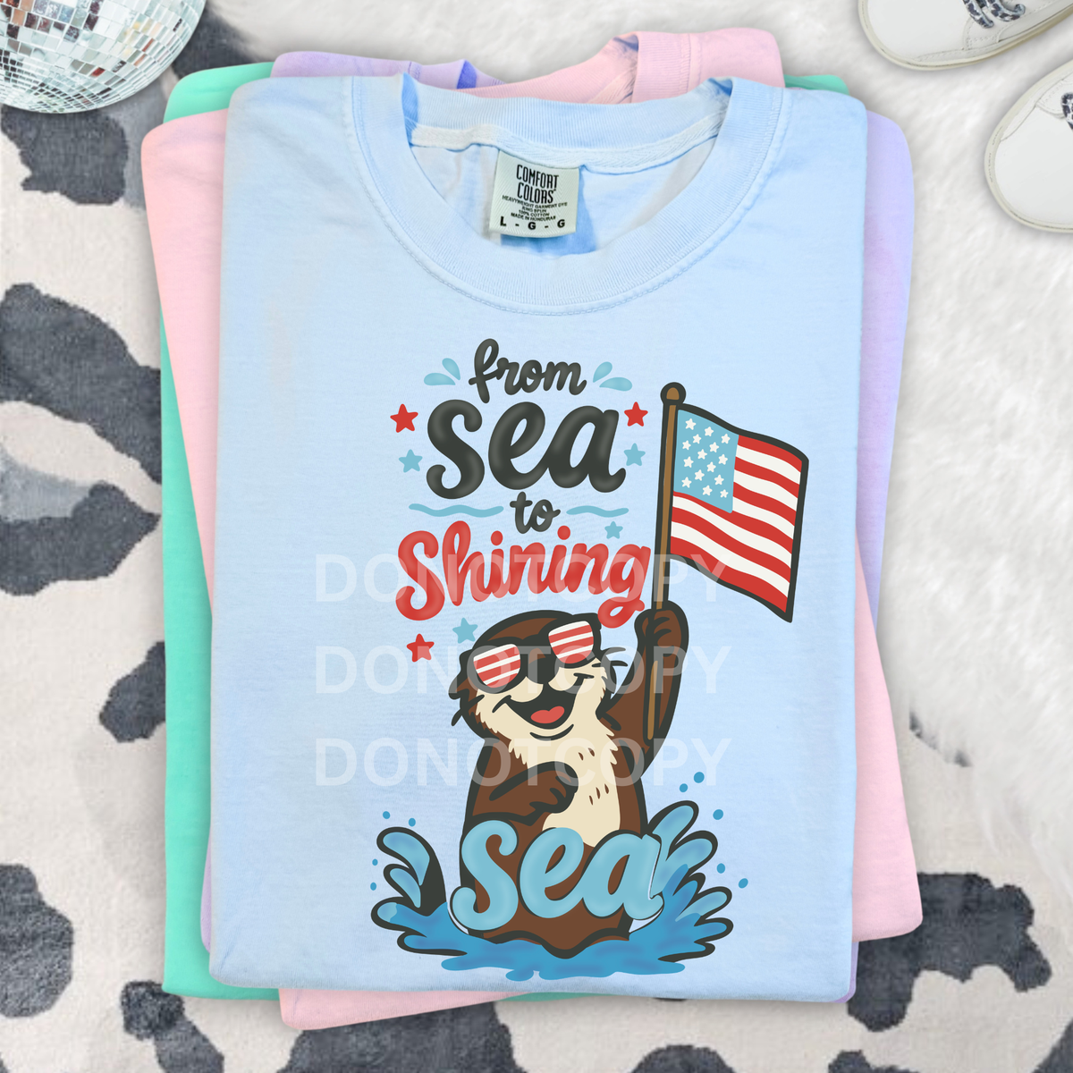 From sea to shining sea otter (CSG) DTF Transfer
