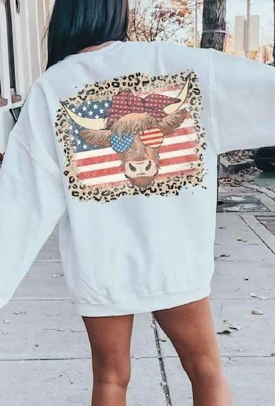 Cow with red head band flag and leopard background 26868 DTF transfer