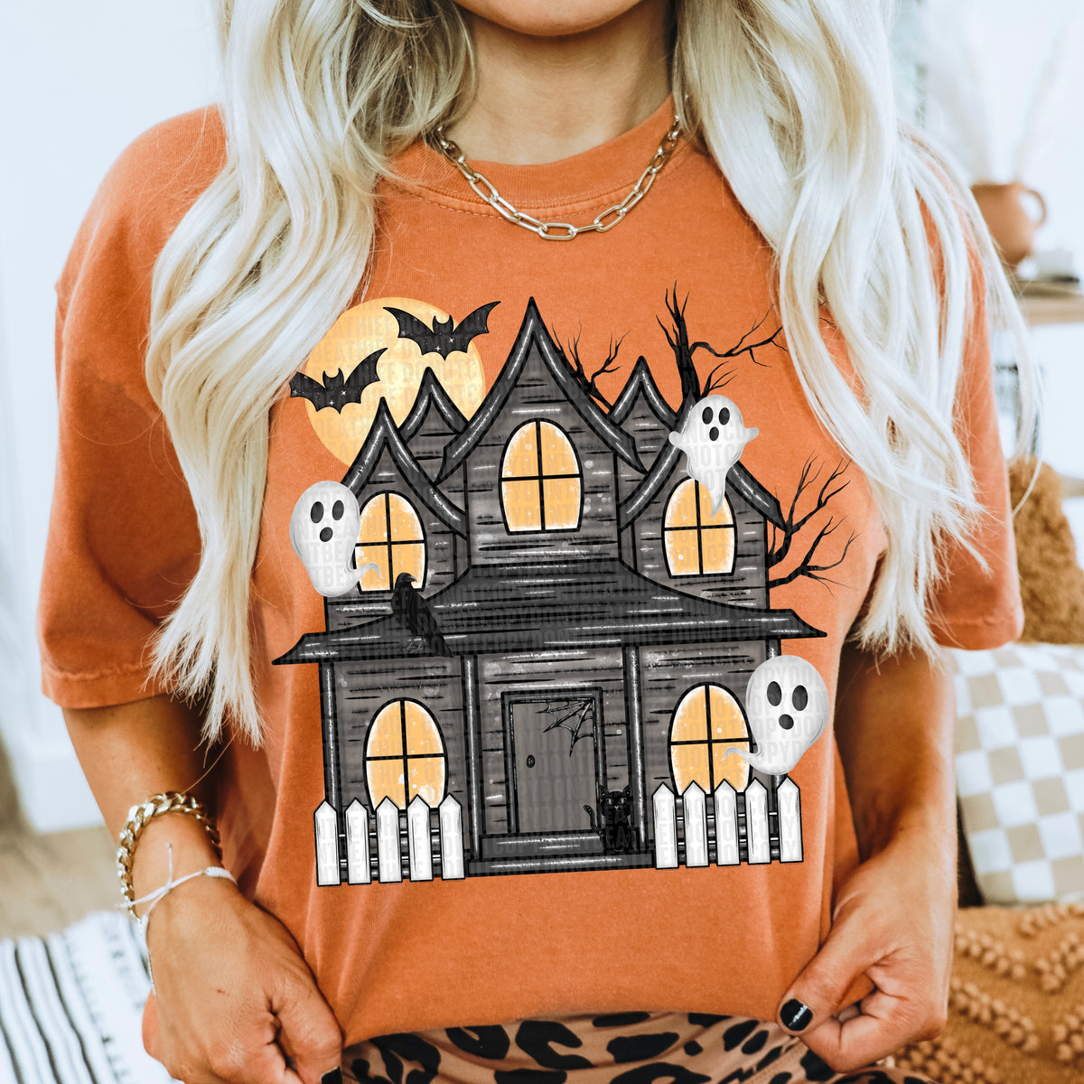 Black haunted house with ghost orange shadows DTF transfer