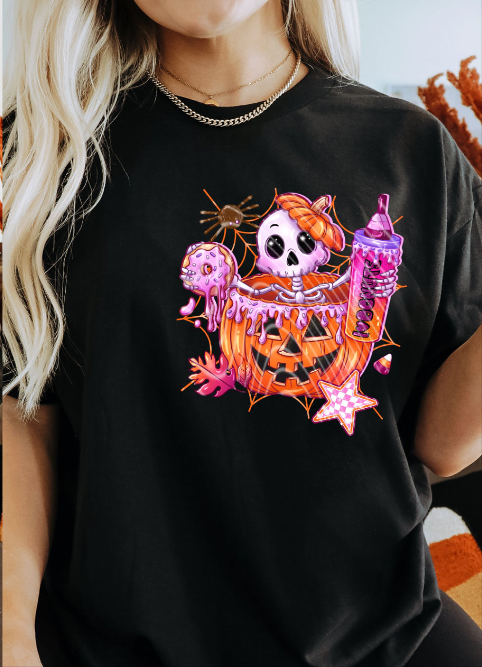 Pumpkin and skellie with donuts Gravitee DTF transfer