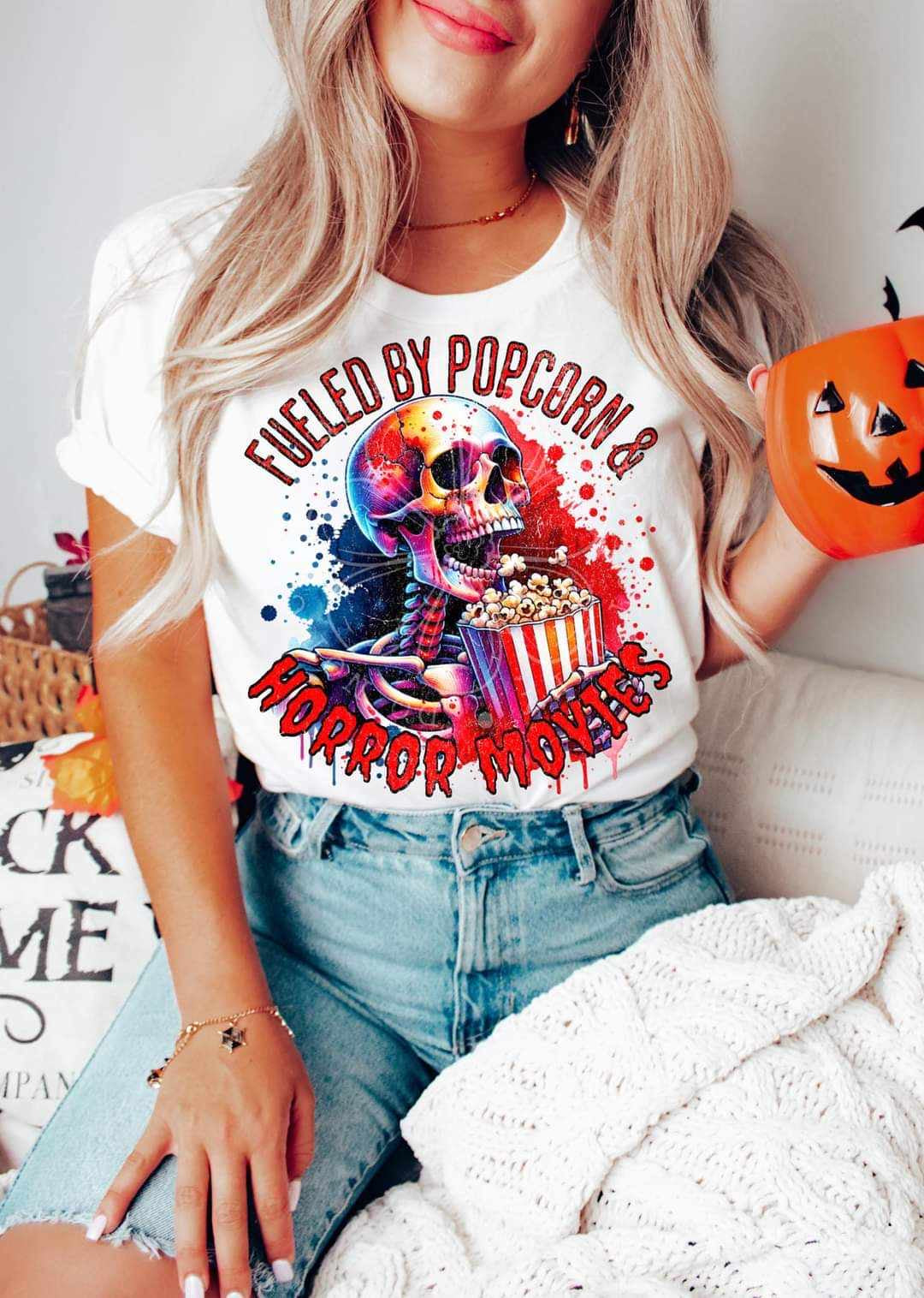 Fueled by popcorn & horror movies (LYTTLE) 43477 DTF TRANSFER