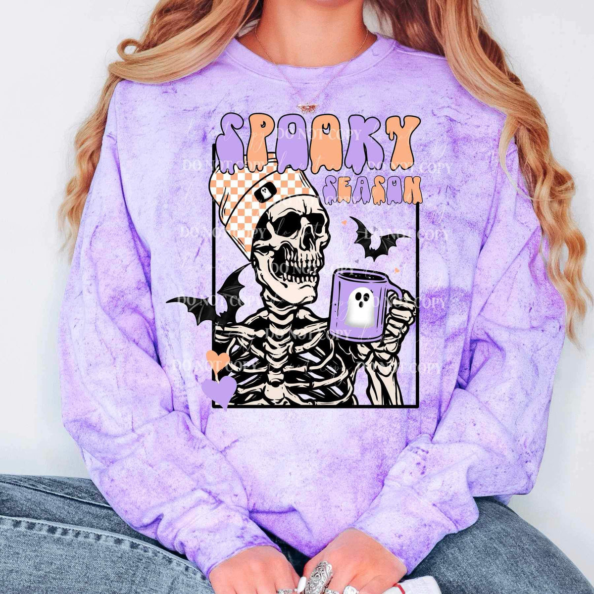 Spooky season (orange and purple font with skellie holding purple ghost mug) 11295 DTF TRANSFER