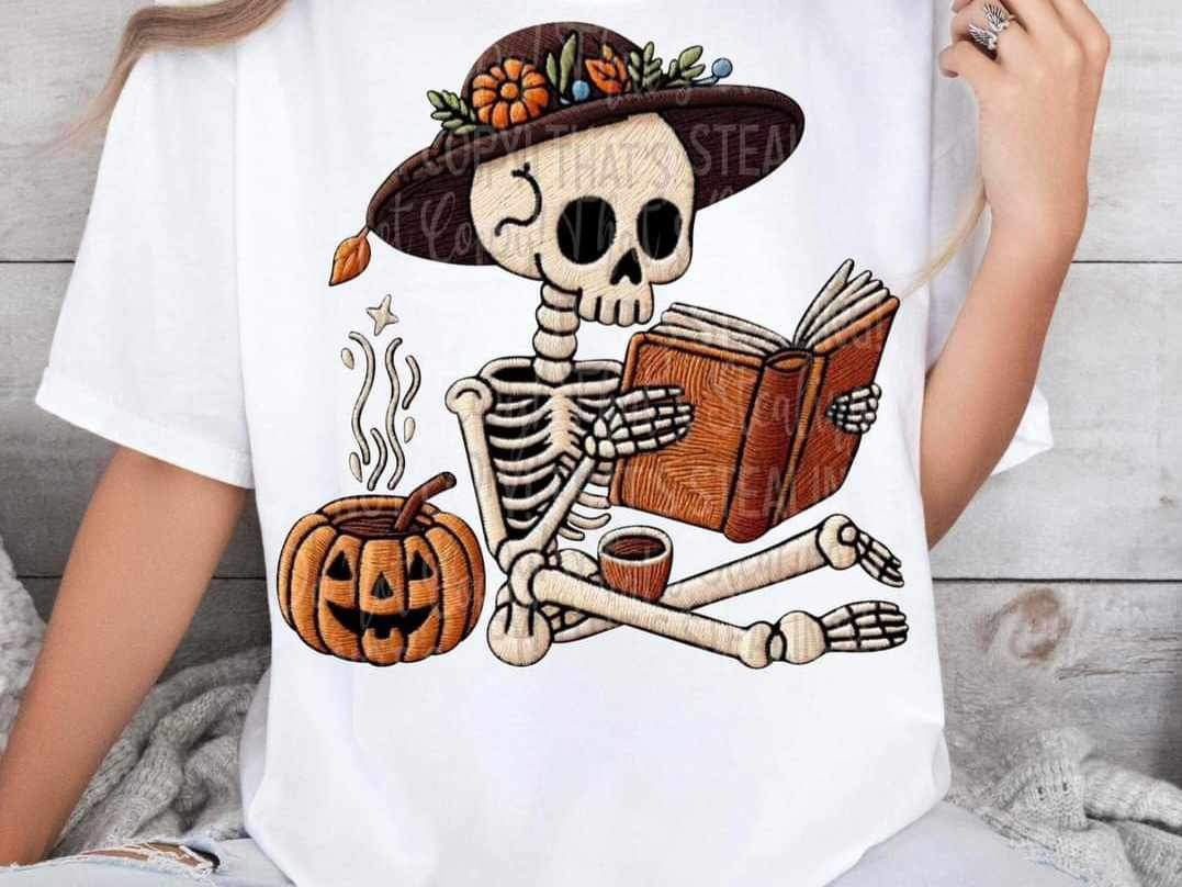 Skellie reading book with pumpkin 24010 DTF transfer