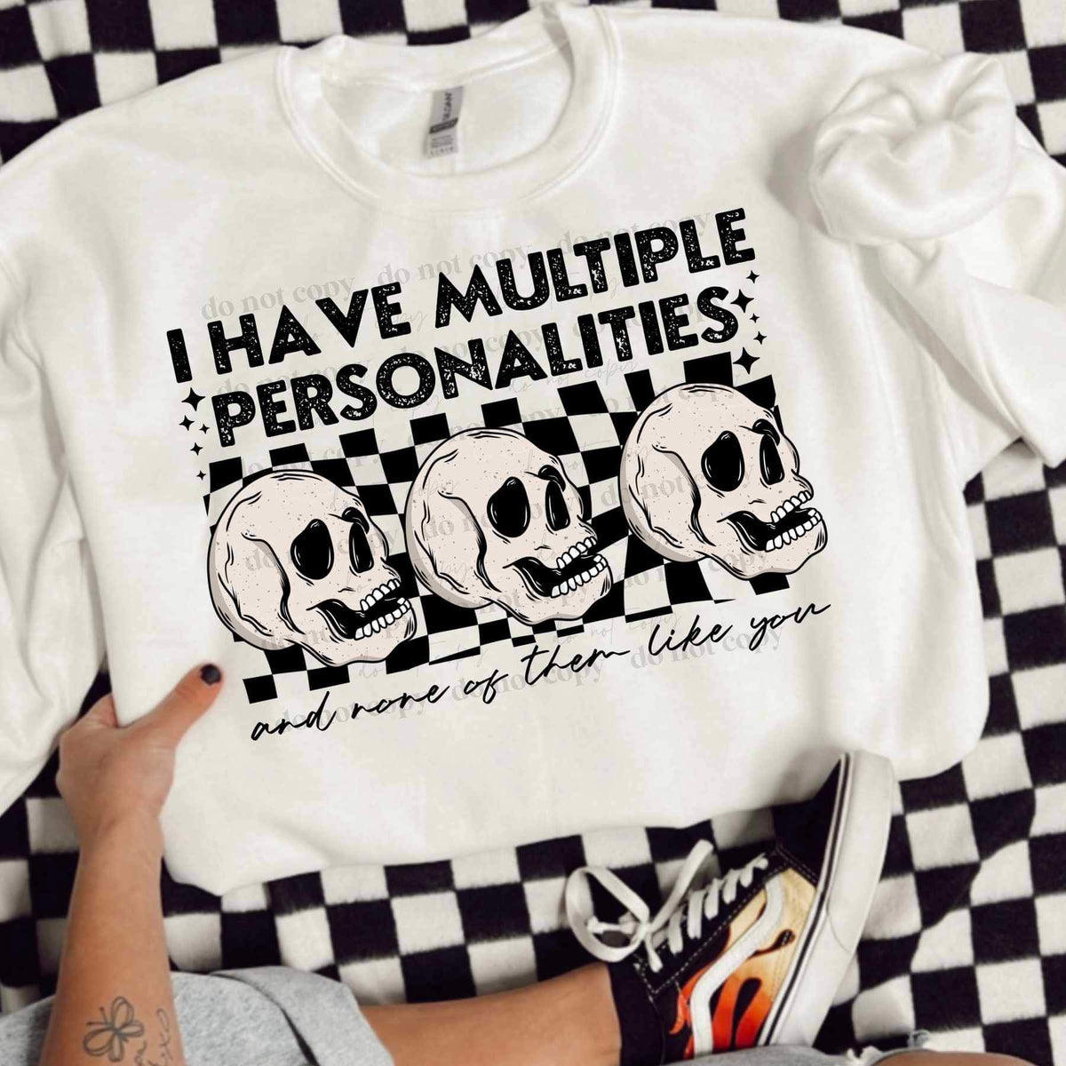 I have multiple personalities skulls black checkered (CSC) 25298 DTF transfer