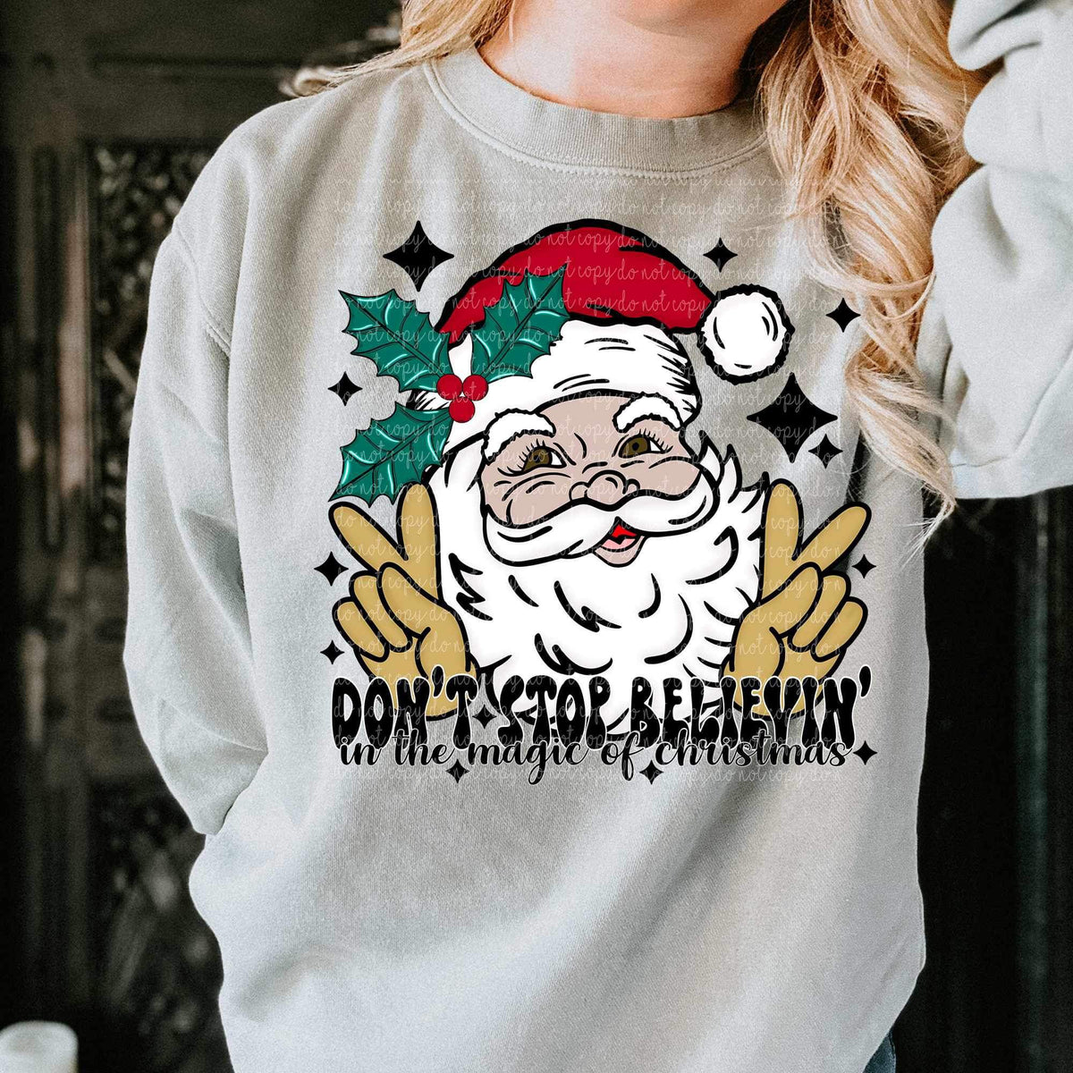 Don’t stop believing in the magic of Christmas (santa making peace signs) (CMLD) 15740 DTF Transfers