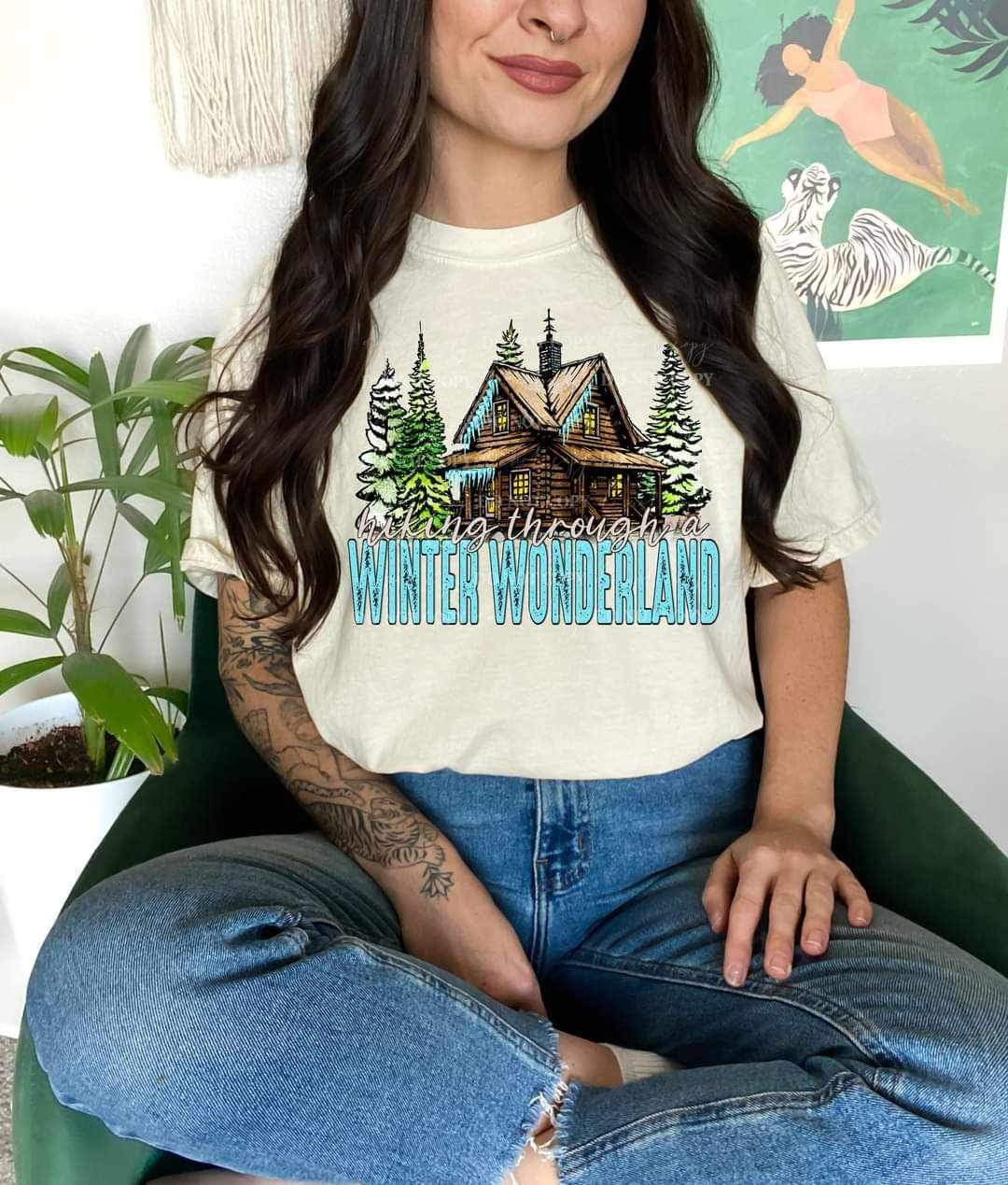 Hiking through a winter wonderland with cabin and trees (LYTTLE) 16435 DTF Transfer