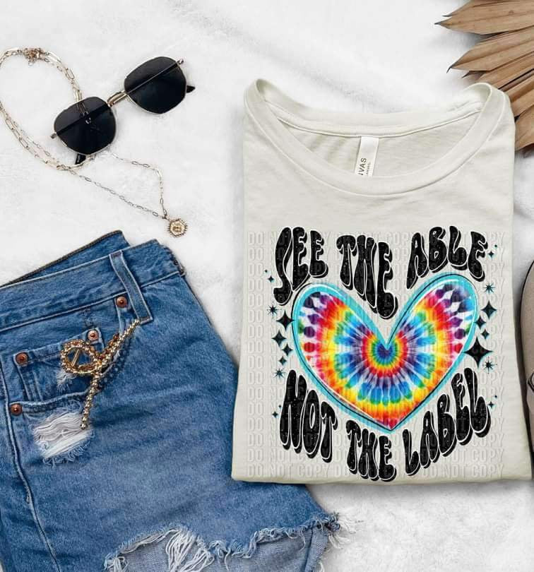 See the able not the label black font tie dye filled heart (CCD) 26273 DTF transfer