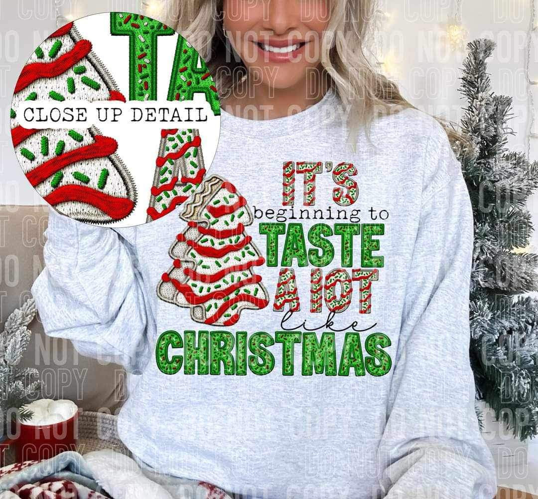 Its beginning to taste a lot like Christmas (faux with green sequin, Christmas cake font with cake) 16516 DTF Transfer