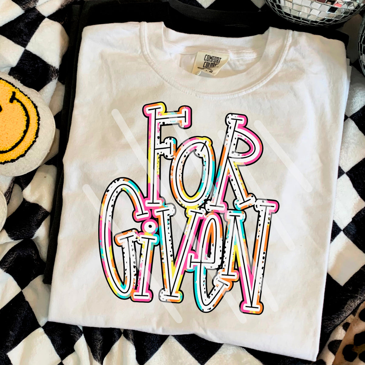 Forgiven (colorful Dalmatian font) 110610 DTF transfer