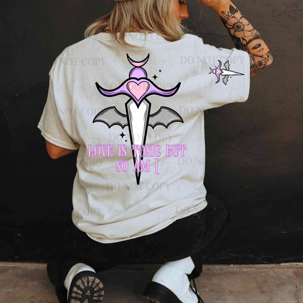 Love is toxic but so am i purple sword with bat wings 19514 DTF Transfer