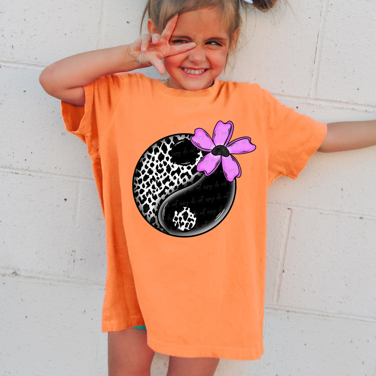 Black dotted and white ball VIRGO DTF transfer