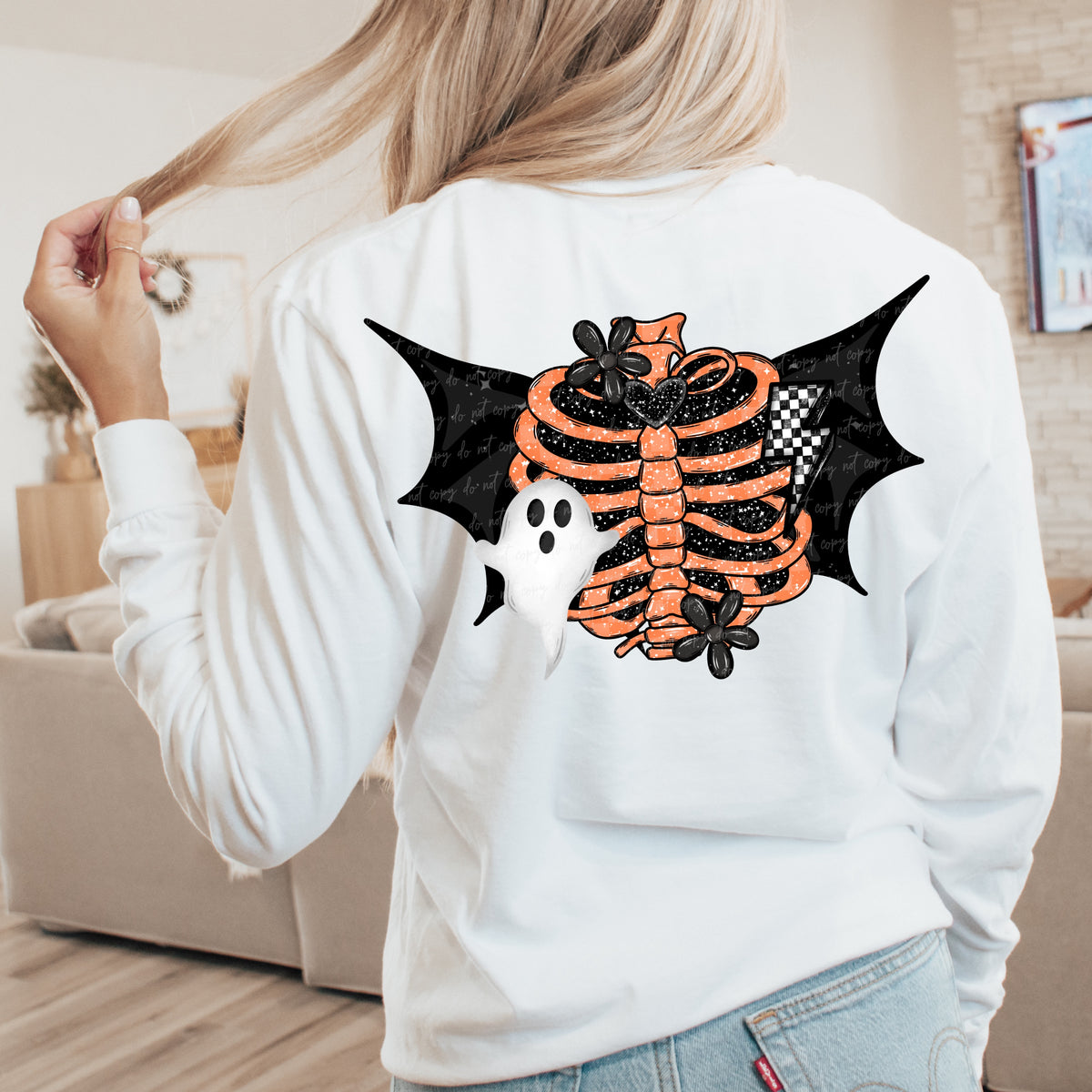 Orange rib cage bat with ghost VIRGO DTF transfer
