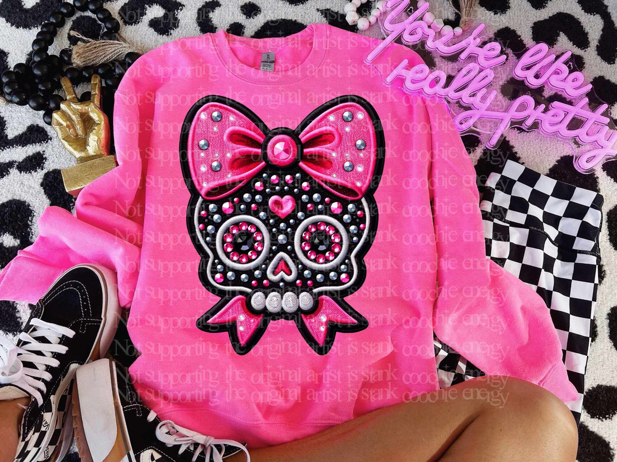 Bedazzled skull with pink bow on head (GWD) 41789 DTF transfer