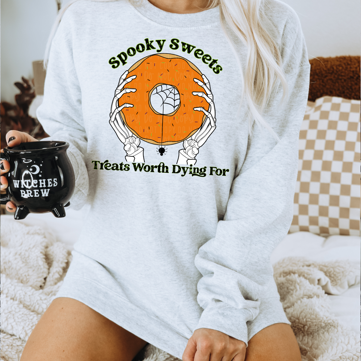Spooky Sweets treats worth dying for (skellie arms holding donut) 11488 DTF TRANSFER