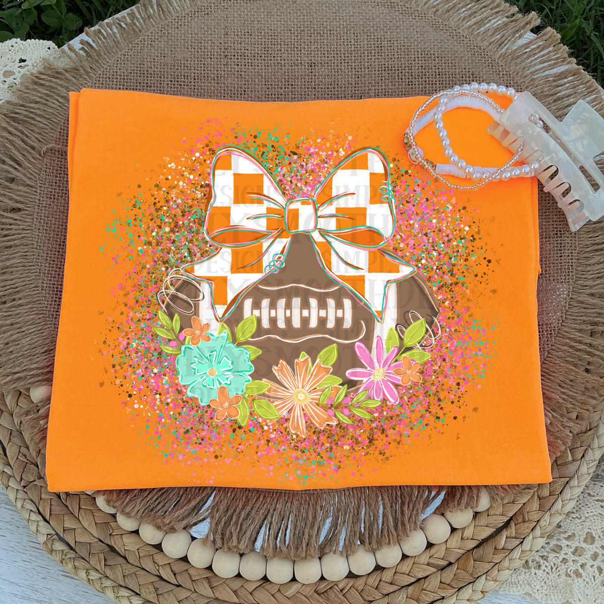 Football with orange and white bow SSD DTF Transfer